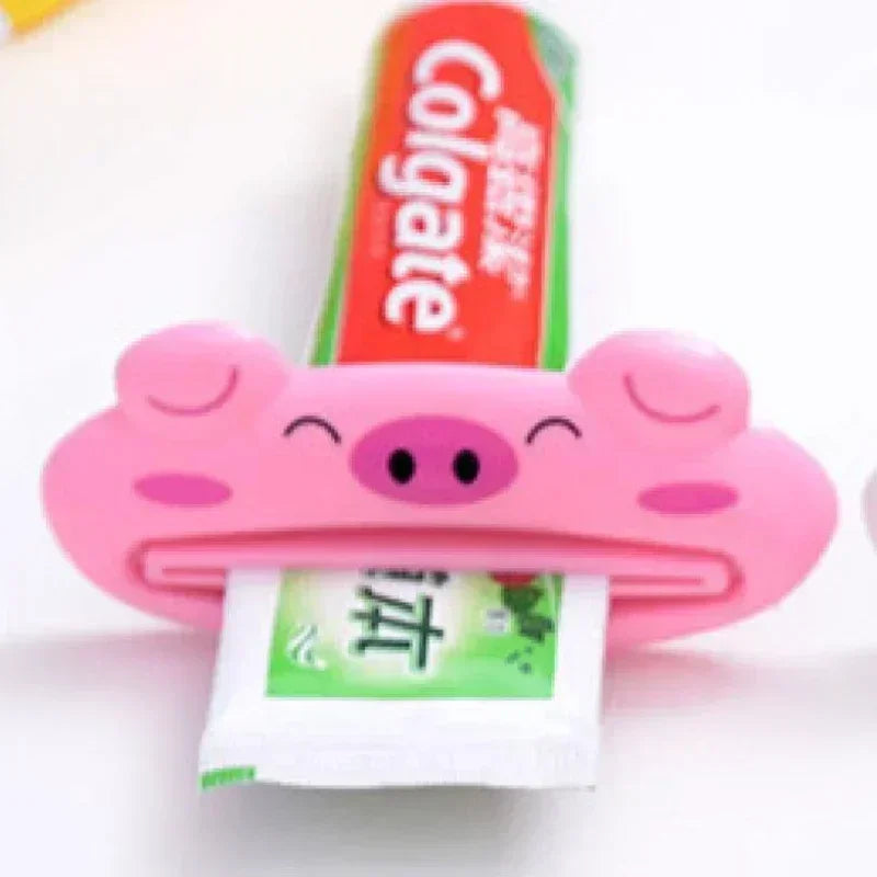 Lindo dispensador de pasta de dientes en caricatura enrollable, clips para limpiador facial, soporte de pasta de dientes para niños, ahorrador de tubo, accesorios de baño