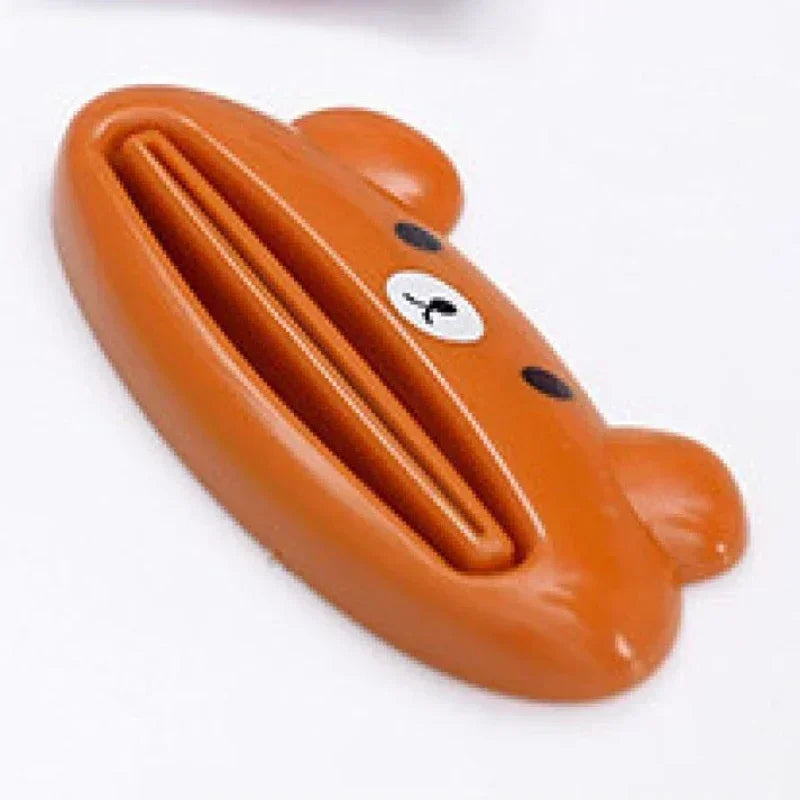 Lindo dispensador de pasta de dientes en caricatura enrollable, clips para limpiador facial, soporte de pasta de dientes para niños, ahorrador de tubo, accesorios de baño