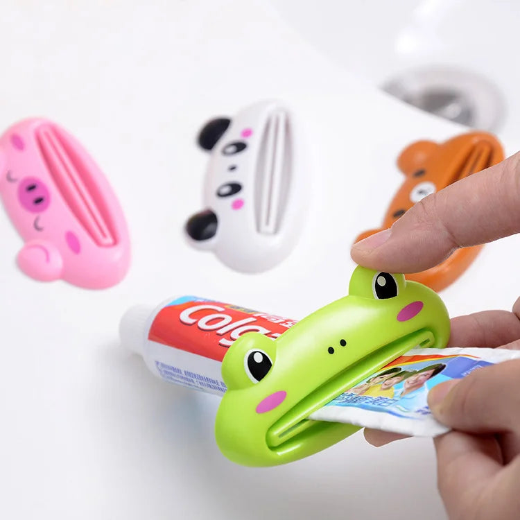 Lindo dispensador de pasta de dientes en caricatura enrollable, clips para limpiador facial, soporte de pasta de dientes para niños, ahorrador de tubo, accesorios de baño